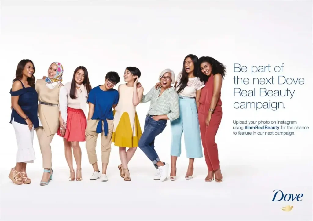 A diverse group of women stands together, promoting unity for the Dove Real Beauty campaign with a call to share personal photos.