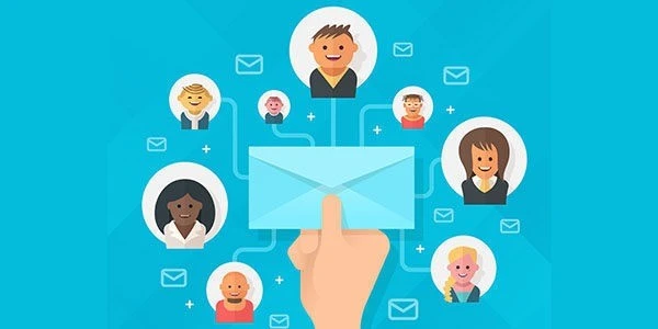 A hand holding an envelope connected to illustrated user profiles, symbolizing communication and networking through email.